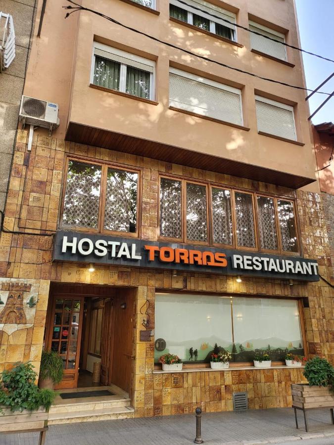 Hostal Torras Sant Hilari Sacalm Exterior photo